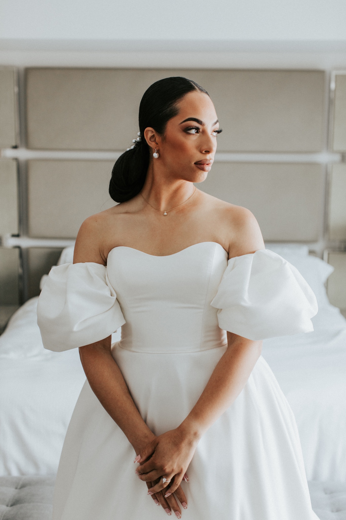 a portrait of a bride in her wedding dress 